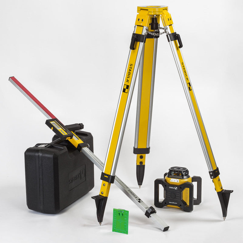 Laser rotatif STABILA LAR 160 G avec faisceau vert, trépied jaune et accessoires.