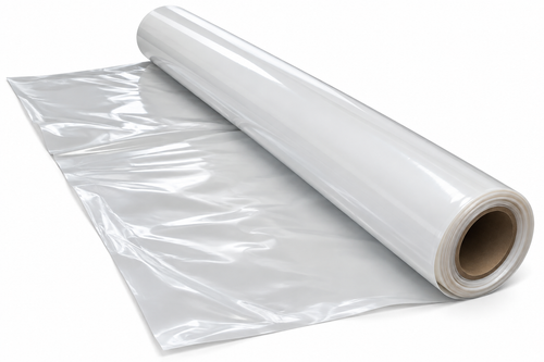 Rouleau de film plastique transparent, avec une partie déroulée sur une surface plane.