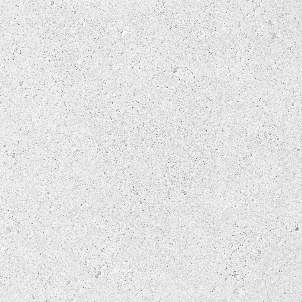 Appui de fenêtre en béton préfabriqué avec finition à face éclatée, surface texturée et naturelle.