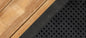 Panneau drainant DELTA®-DRAIN 6000 HI-X avec noyau alvéolé en polypropylène et géotextile, conçu pour l'évacuation de l'eau.