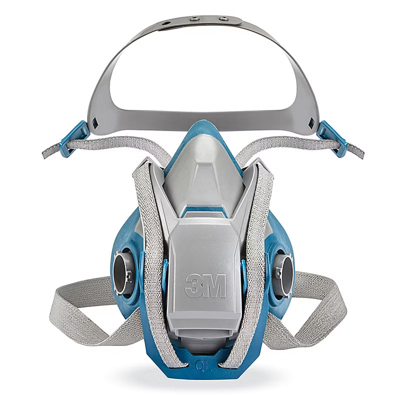 Masque de protection respiratoire 3M en bleu et gris, avec des sangles ajustables et des filtres latéraux.