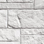 Mur en pierre de béton texturée, au look moderne et zen.