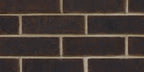 Briques en terre cuite de couleur brun foncé, disposées en motif de maçonnerie sur un mur.