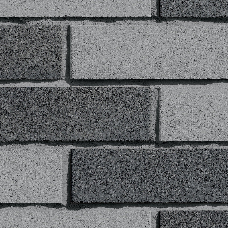 Briques en béton gris foncé et gris clair disposées en motif de maçonnerie. Texture rugueuse et finition mate.