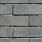 Brique de béton classique Romania pour revêtements de façade, couleur grise et texture rugueuse.