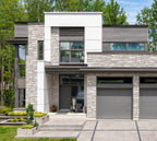 Pierre de béton grise avec texture légèrement ciselée, parfaite pour revêtement de façade.