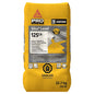 Sac de 22,7 kg de Sika Level 125CA, produit de nivellement auto-nivelant, avec étiquette de danger.