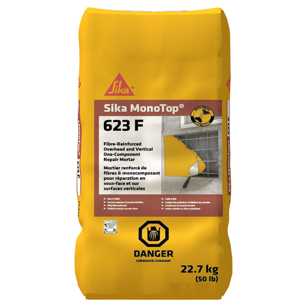 Mortier de réparation renforcé de fibres Sika MonoTop 623 F, sac jaune de 22,7 kg, avec symbole de danger.