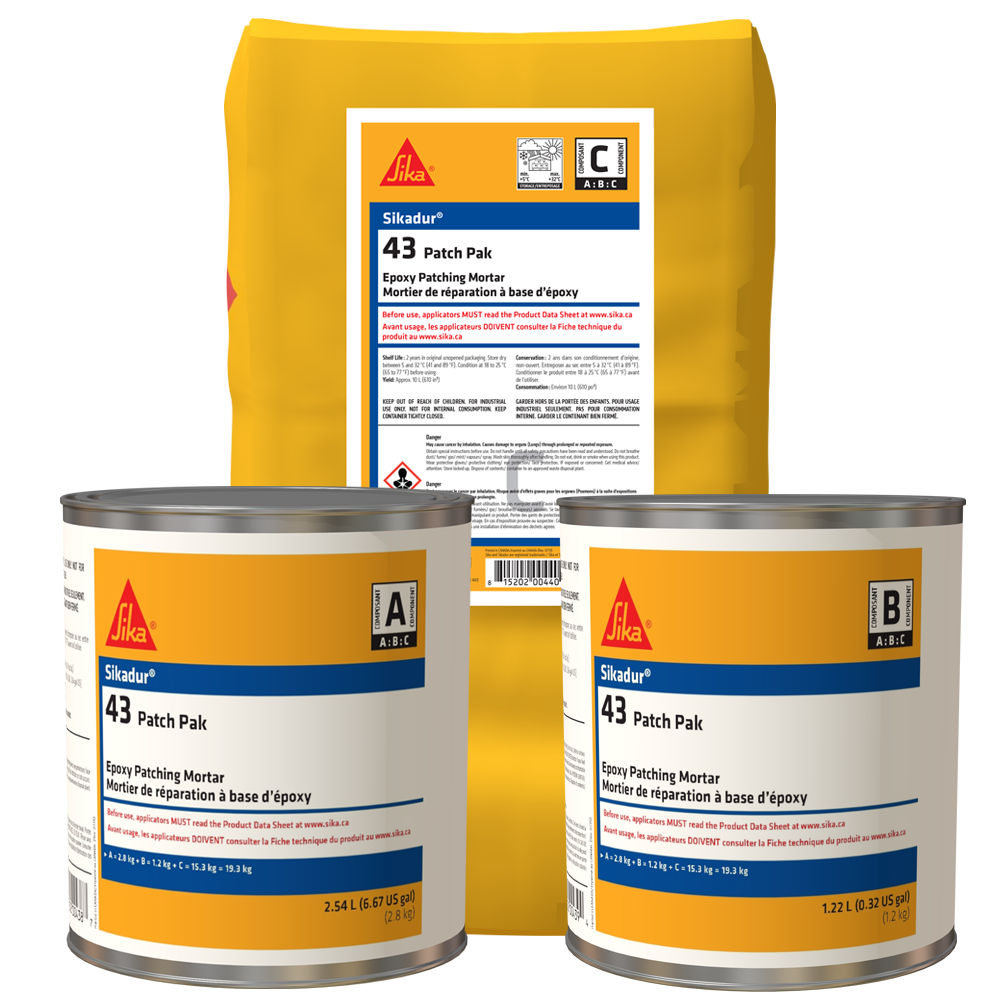 Sika Sikadur 43 Patch Pak epoxy mortar, includes two containers and a powder bag, used for repairs.