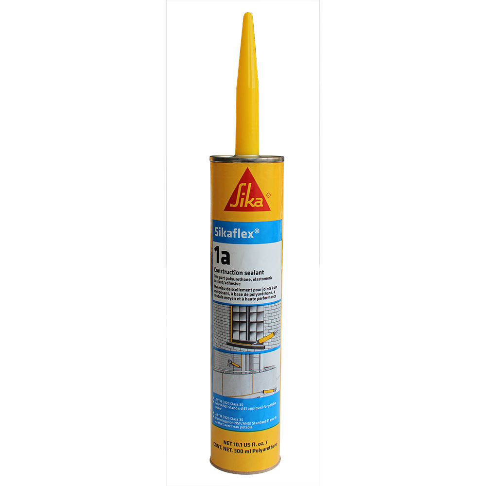 Tube de mastic Sika Sikaflex 1a, couleur jaune, avec embout applicateur, étiquette informative sur le produit.