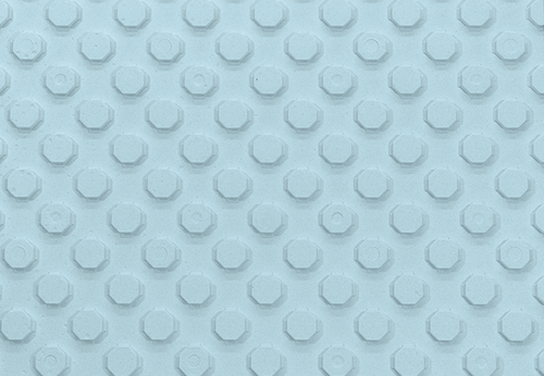 Panneau isolant Hydrofoam® en polystyrène expansé, avec système d’ancrage pour tubes de chauffage radiant.