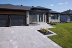Brique Cinco Plus® grise avec un fini texturé, idéale pour des façades distinctives.