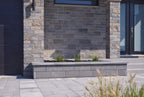 Brique Cinco Plus® grise avec un fini texturé, idéale pour des façades distinctives.