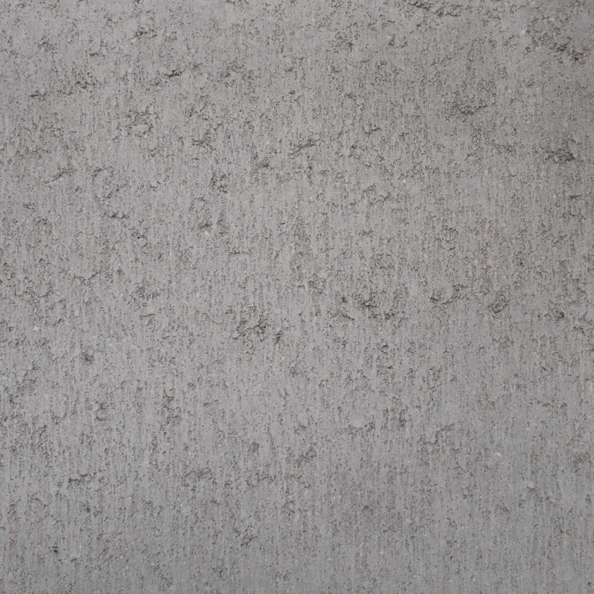 Bloc de maçonnerie architectural gris au fini lisse, conçu pour une apparence contemporaine.