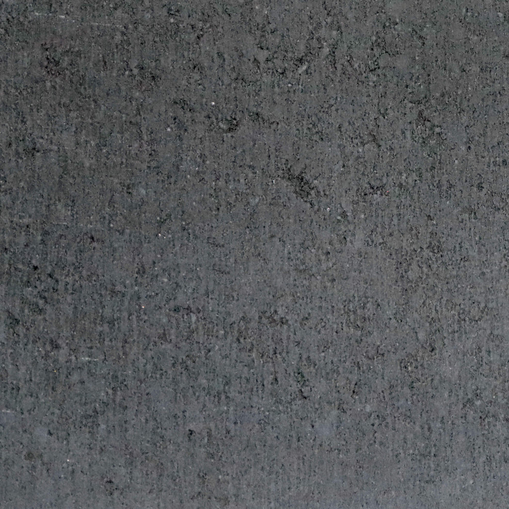 Bloc de maçonnerie architectural gris au fini lisse, conçu pour une apparence contemporaine.